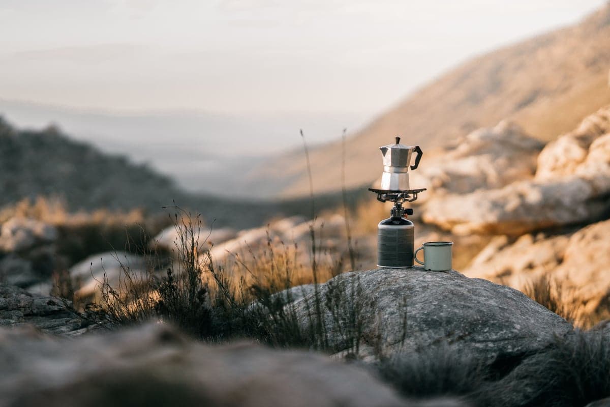 The best coffee you'll ever drink. Camp stove, tin cup, and nobody around for miles.