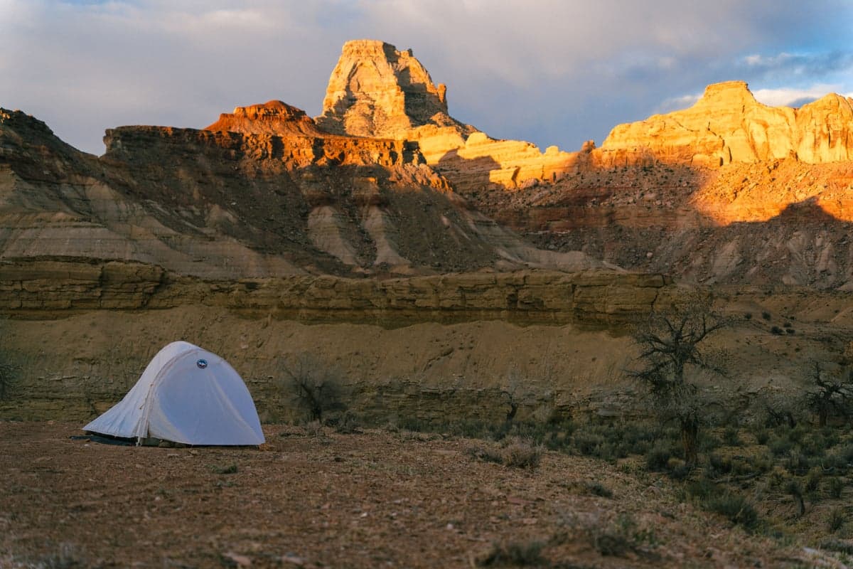 Canyon camping at sunset. Multi-day float trips on the Lower Deschutes are a bucket-list experience for Western anglers.