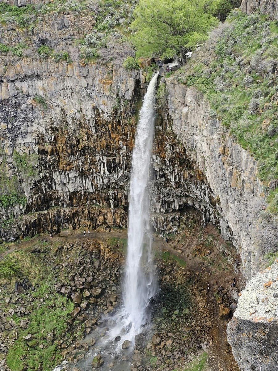Idaho's dramatic waterfalls are a reminder of the volcanic landscape the Henry's Fork cuts through