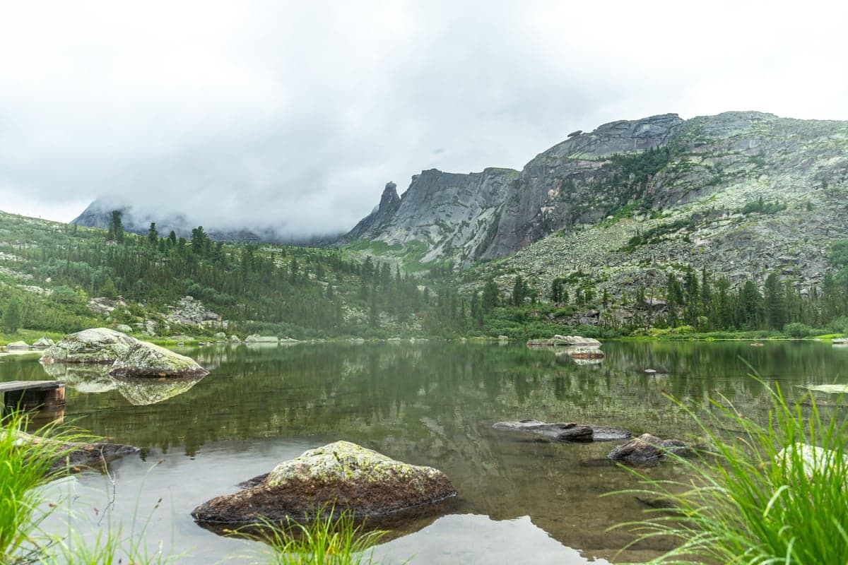 When every river in the county is blown, a mountain lake like this is calm, cold, and full of fish that haven't seen a fly in months.