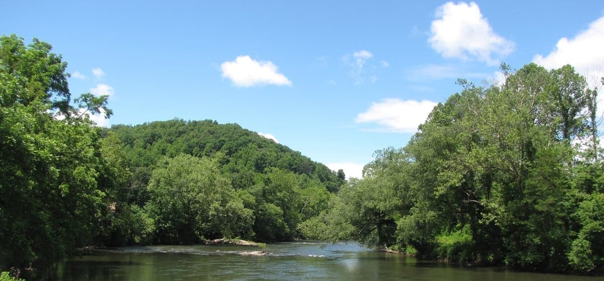 The Tuckasegee offers wide, wadeable water and heavy stockings during Delayed Harvest season