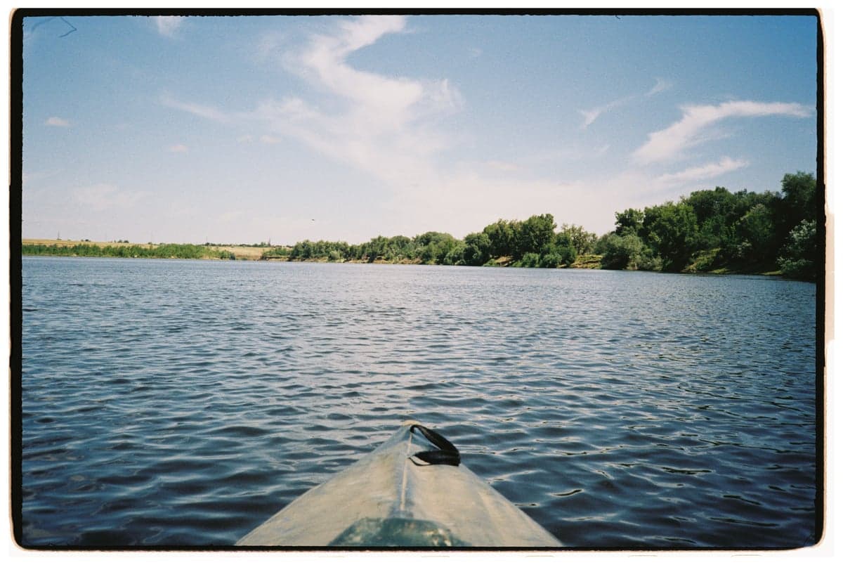 Canoeing on a calm stretch of river in summer. The upper Delaware is a popular destination for paddlers, with Class I-II water and plentiful public access.