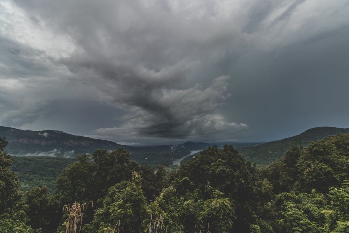 An afternoon cell building over high country. What a storm like this does over the burn scar in the next hour matters more to your day than the current gauge reading.