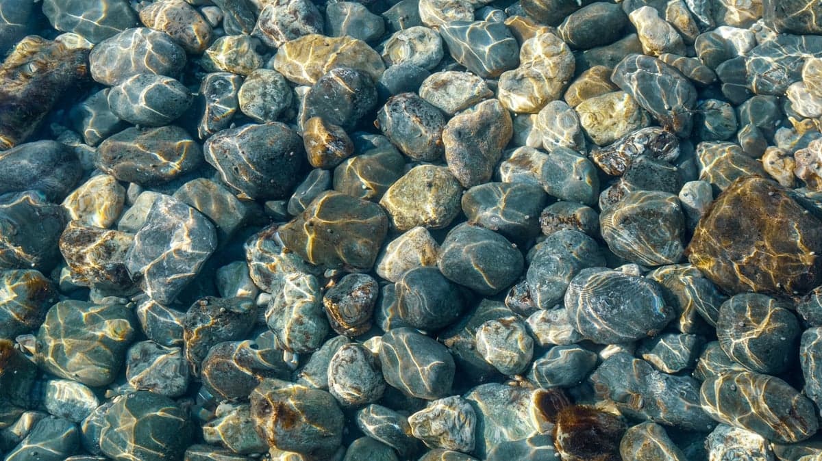 Clean, bright, sorted gravel in shallow water. If it looks scrubbed compared to everything around it, go around.