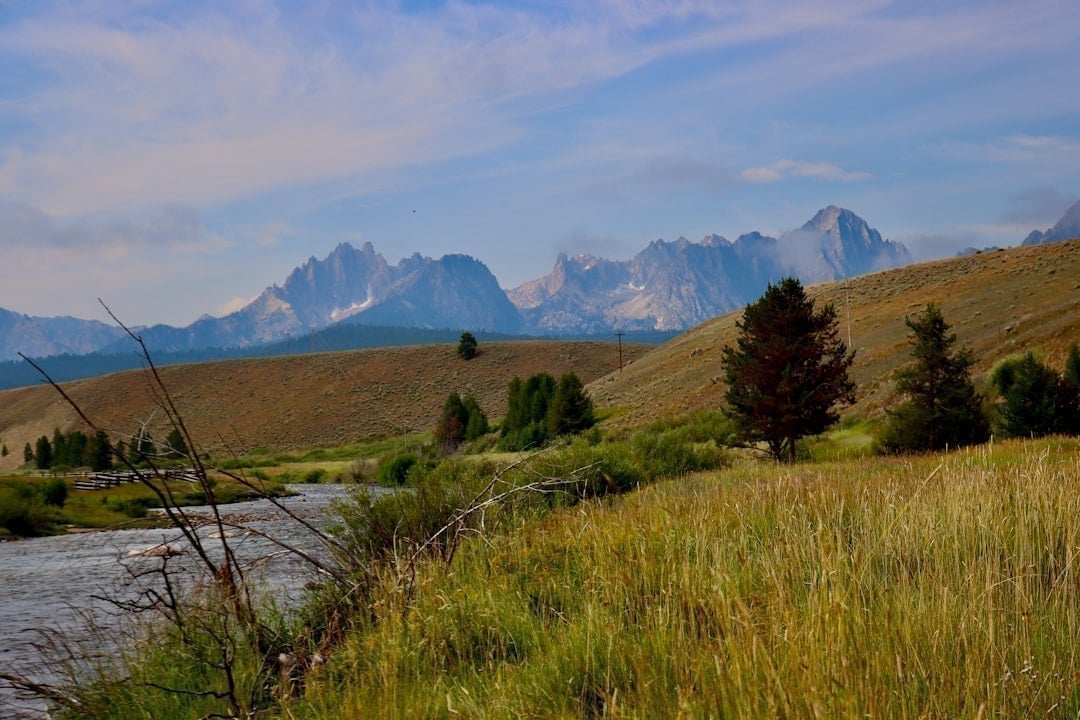 Sawtooth Range mountains rising above an Idaho river valley