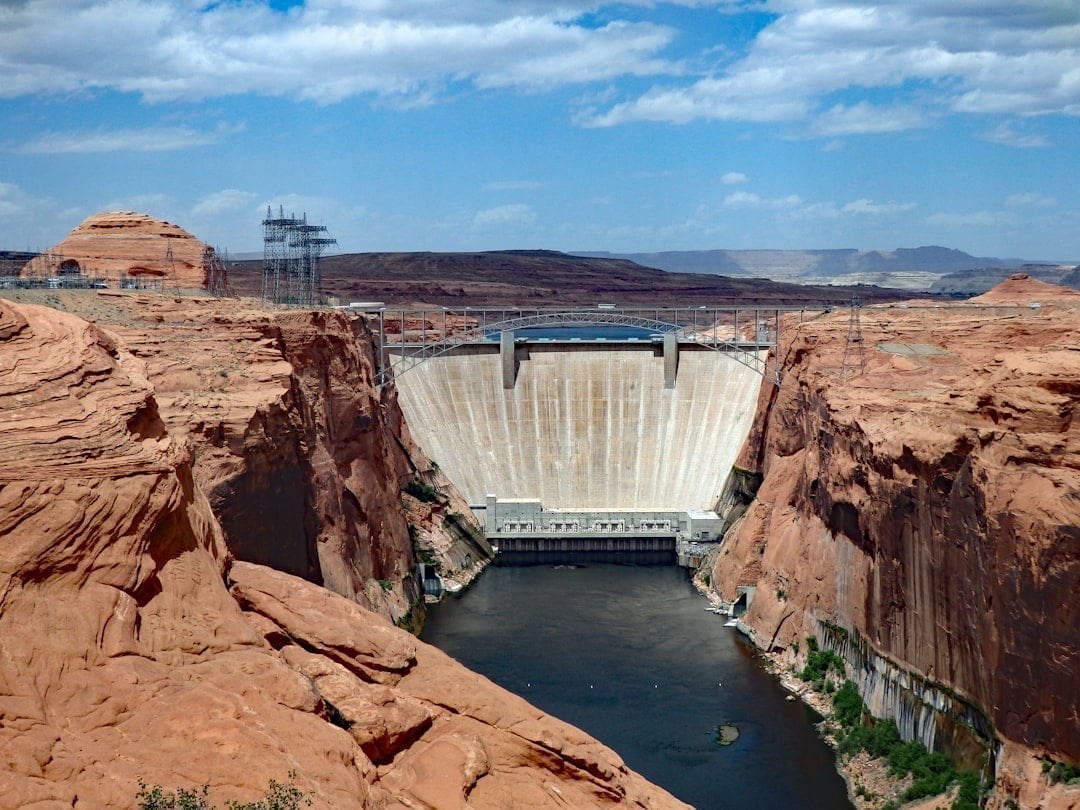 Glen Canyon Dam releasing cold, clear water into the Colorado River